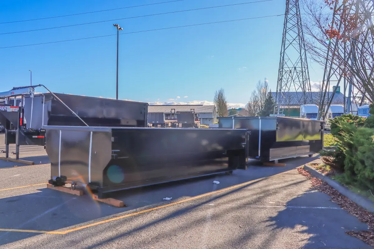 Roll-off dumpster ready for waste disposal at job site for 2 Yard Dumpster Rental in Middle River